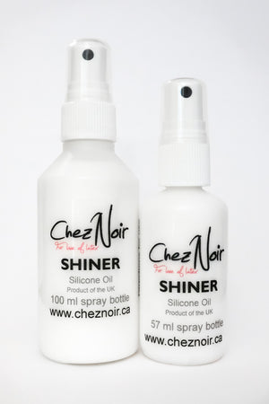 Two bottles of latex shiner, for making your latex shiny.