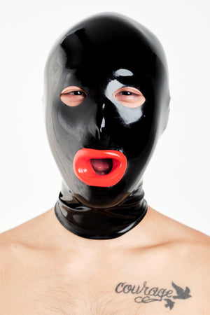 A man wearing a black latex hood with red lips.