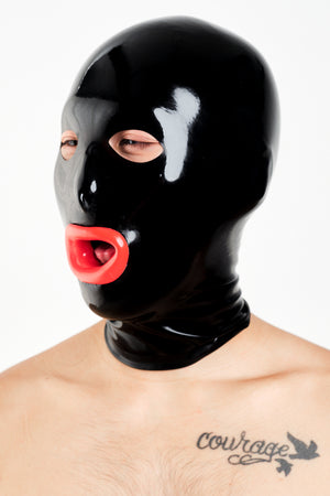 A man wearing a black latex hood with red lips.