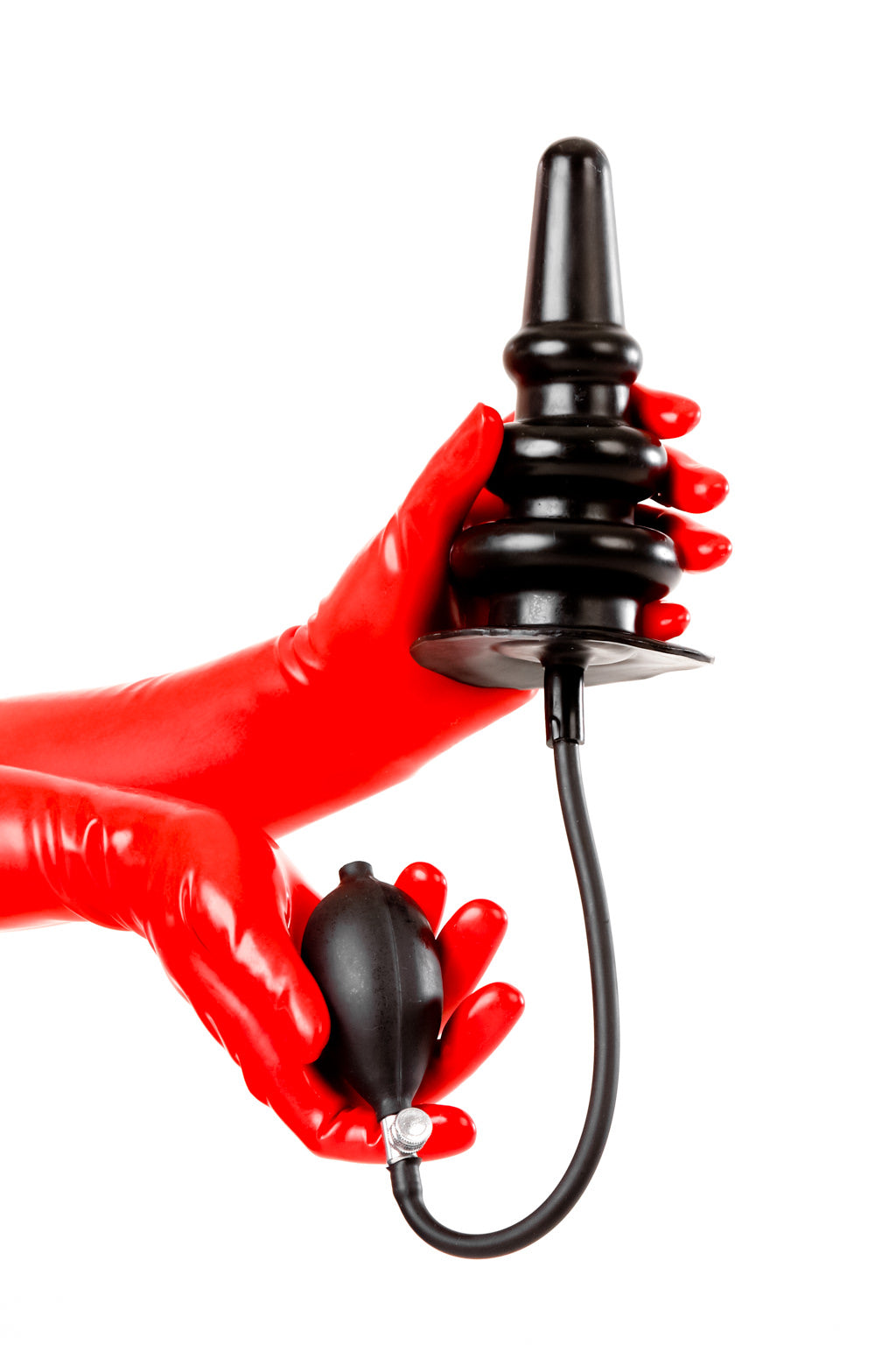 Red latex gloves holding an extra large ribbed butt plug.