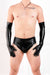 A man wearing a pair of latex elbow gloves and latex underwear. 