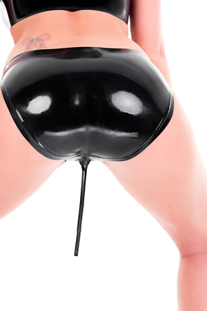 A woman wearing latex flushing panty briefs.