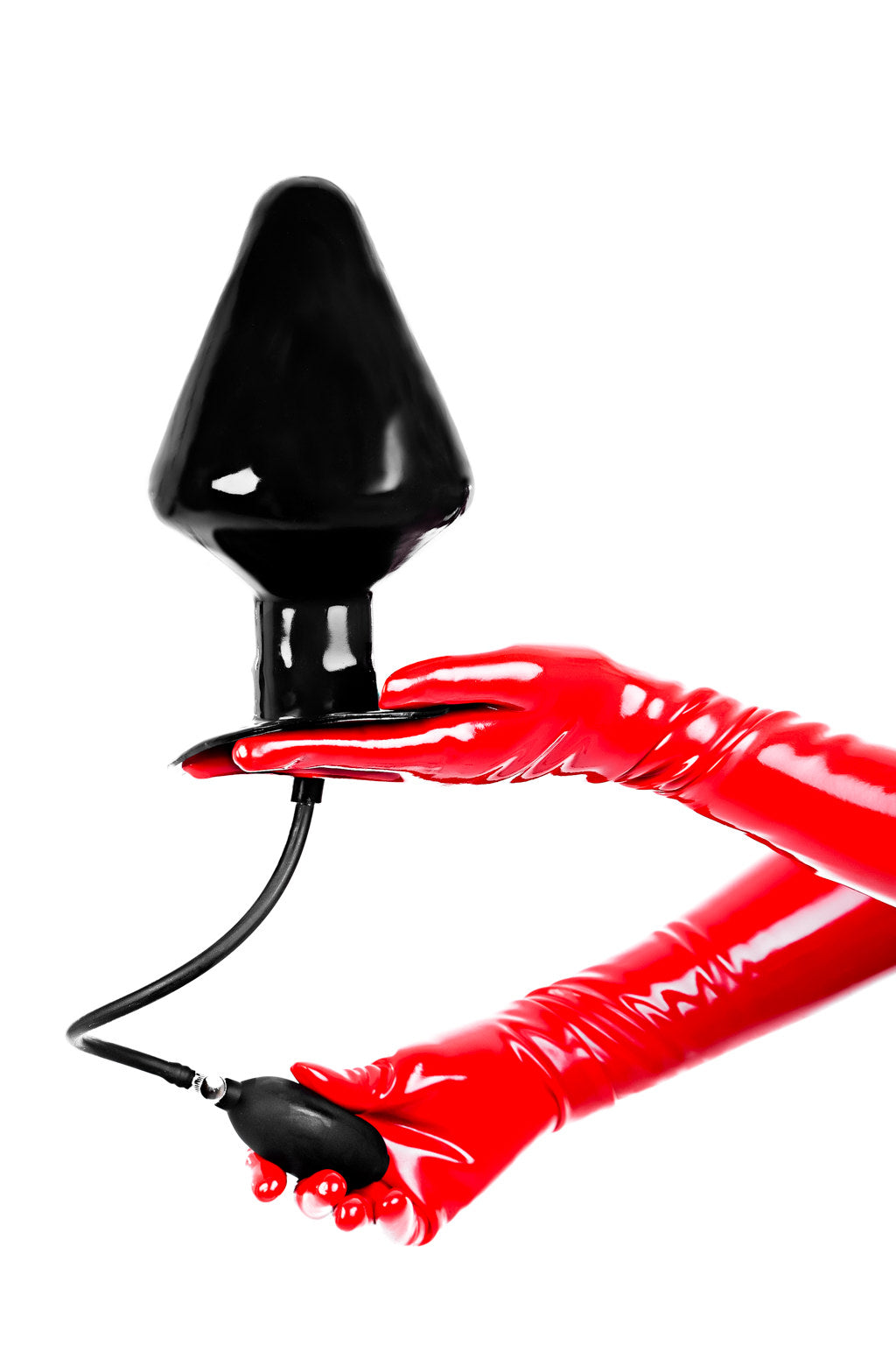 Red latex gloves holding an extra large inflatable gargantuan butt plug.