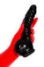 Red latex gloves holding an anatomical cock and ball penis sheath.