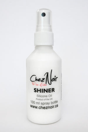 A bottle of latex shiner, a latex dressing aid.