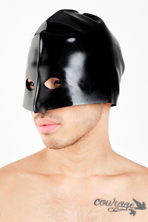 A man wearing a black latex executioners mask.