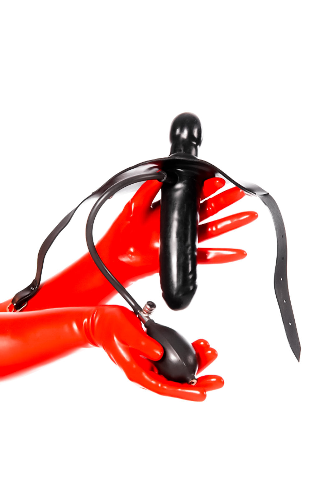 Red latex gloves holding a strap-on inflatable gag with dildo.