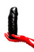 Red latex gloves holding a solid dildo.