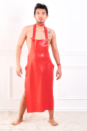 A man wearing a red latex choker and a matching long latex apron.