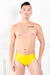 A man wearing a pair of yellow latex underwear.
