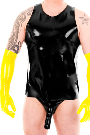 A man wearing a latex top and briefs and yellow latex elbow gloves.